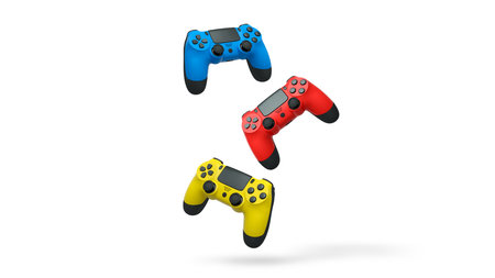 Wireless gaming controllers flying in air isolated on white background with clipping path,...