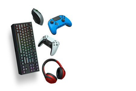 Gaming keyboard, mouse, controller and headphones floating in air, isolated on white background with...
