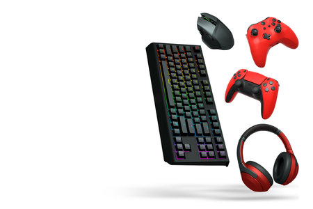 Gaming headset, console controller, ergonomic mouse, and RGB keyboard isolated on white background...