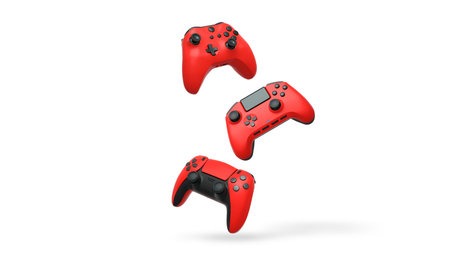 Wireless gaming controllers flying in air isolated on white background with clipping path,...