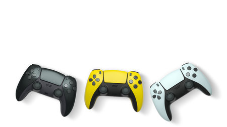 Wireless gaming controllers flying in air isolated on white background with clipping path,...