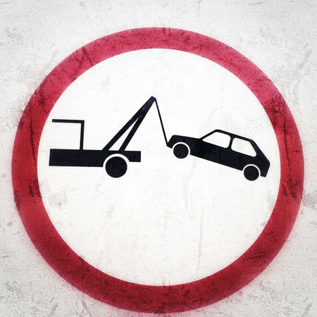 Tow-away sign, grunge backgroundの写真素材