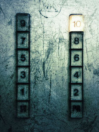 Grunge green elevator buttonsの写真素材