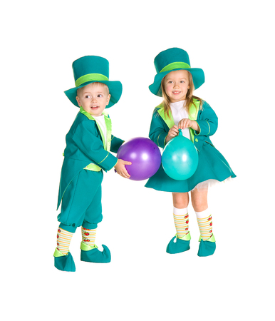 Children in costumes leprechaun, St. Patrick's Day, isolated on white backgroundの写真素材