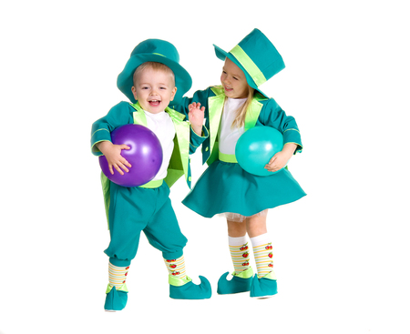 Children in costumes leprechaun, St. Patrick's Day, isolated on white backgroundの写真素材
