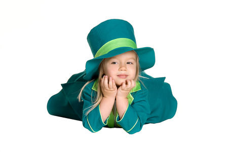 Child in costumes leprechaun, St. Patrick's Day, isolated on white backgroundの写真素材