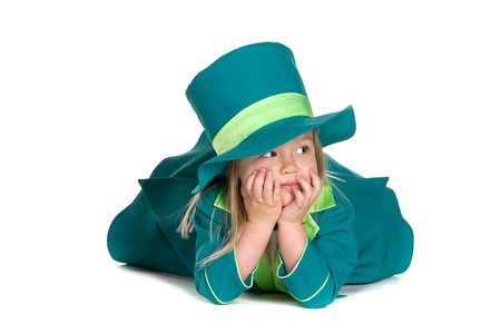 Child in costumes leprechaun, St. Patrick's Day, isolated on white backgroundの写真素材