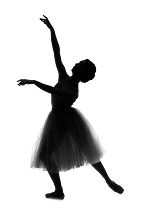 Ballet dancer silhouette isolated on white backgroundの写真素材