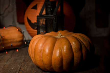 Halloween pumpkins on the wooden floorの写真素材