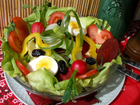 Yummy provencal salade perfect for summertime with a wide selection of raw  and fresh vegetablesの写真素材