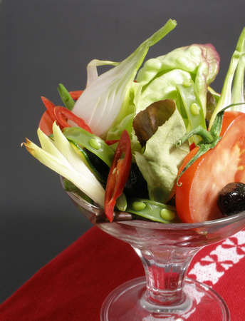 A selection of cut raw vegetables to be served as an appetizerの写真素材