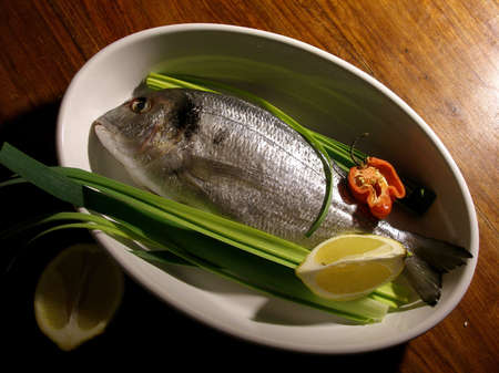 Gilded head sea bream ready to go in the ovenの写真素材