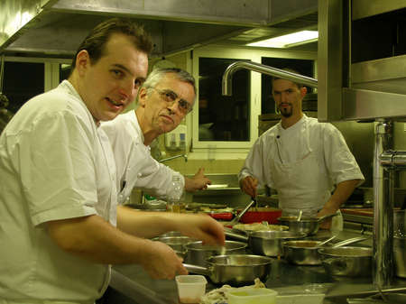 Chefs during rush hours in the kitchenの写真素材