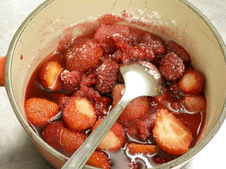 preparing red fruits for dessertの写真素材