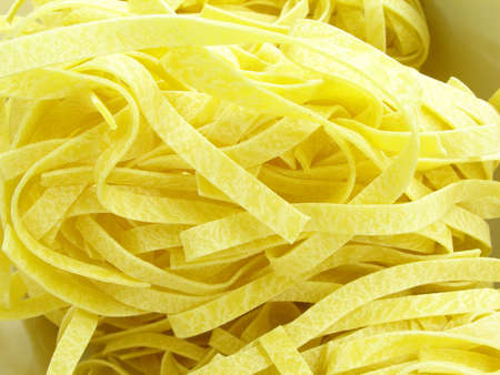 raw pasta waiting to be boiledの写真素材