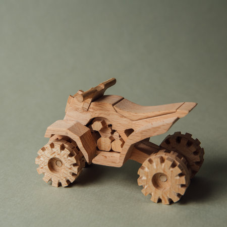 toy wooden quad bike on a green background.empty space. high quality photoの写真素材