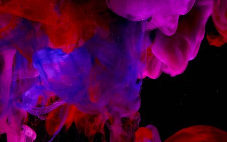 Beautiful color abstract background. Space background. Blue, red and white watercolor ink in water...