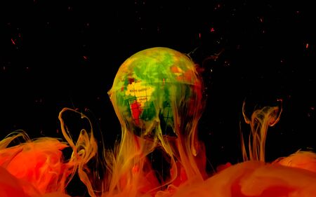 Planet earth on fire from space. Yellow and orange watercolor ink in water on a black background. Ecology and the environment. Save the planet. Ecological catastrophy. Depletion of the Earth.の写真素材