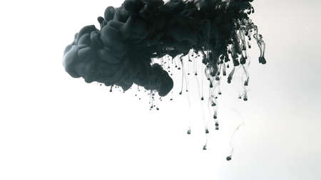 Black cloud of ink on a white background. Drops of black ink in water. Cosmic star background. Environmental pollution concept. Beautiful wallpaper for your desktop. Awesome abstract background.の写真素材