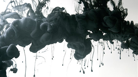 Black watercolor paints in water on a white background. Environmental pollution concept. Desktop wallpaper. Black cloud of ink on a white background. Creative hyptonic background.の写真素材