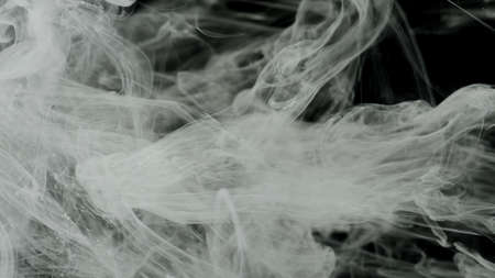 Meditative background. Beautiful milky white awesome abstract background. White acrylic ink in water...