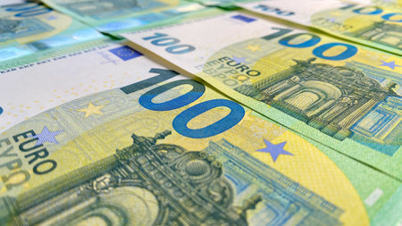 View of 100 euro banknotes. cash banknotes. Financial business background concept. background of cash euro bills. money background. Single currency of the European Union. European currency. One hundred euro.の写真素材