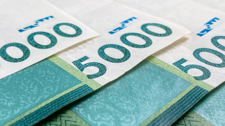 A close-up of a part of the 5000 som bills. Kyrgyz national currency. cash banknotes. Financial...
