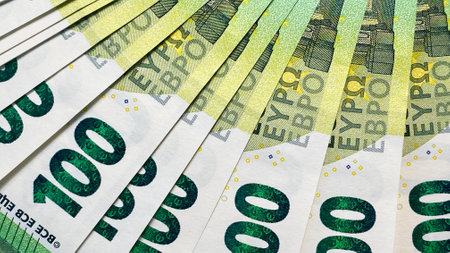 The single currency of the European Union. Business, economics and finance. 100 euro bills are...