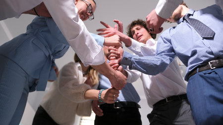 Creative students play a fun leadership development game. Team building for a business company. The...