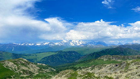View from Kazakhstan of the snow-capped peaks of Belukha in the Altai Mountains. Picturesque landscape. An extraordinary attractive aerial view of the nature of Russia.の写真素材