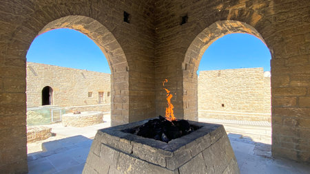 Ateshgah is a temple of fire in Azerbaijan. An eternal flame is burning in a stone structure with arched openings. The temple of fire worshipers Atashgan. A trip to Azerbaijanの写真素材