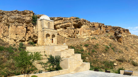 Aerial view of the Mausoleum of Diri Baba. Bomb is admired for its strict architecture and clean lines. Stone building with a small dome at the top is built into the bizarre cliffsの写真素材