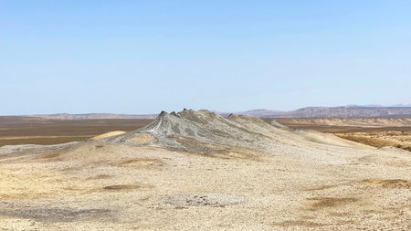 Small mud volcanoes rise in the middle of the desert. A trip to Azerbaijan. A popular tourist...