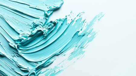 Strokes of pale light blue paint on a white background. Hand-drawn. An element for the design. Abstract backdrop. Splashes and strokes of a light blue-turquoise brush. The spray has a wave shape. Backgroundの素材