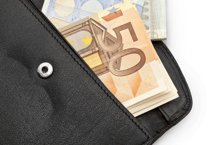 leather black leather wallet with money, some banknotes in black purse, open purse with paper money with moneyの写真素材
