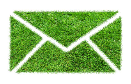 Symbol grass email. Conceptual image of green plant shaped like email signの写真素材