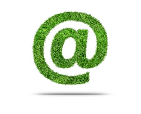 Green grass Email Symbol  isolated on white. Visualization of an address symbol in grassの写真素材