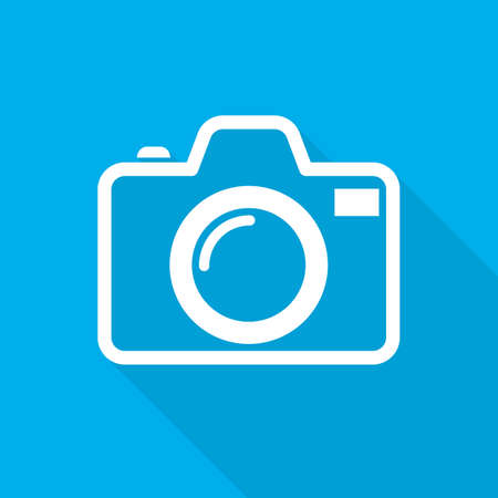 White camera icon in flat design. Vector illustration. Camera icon with long shadow on blue background.のイラスト素材