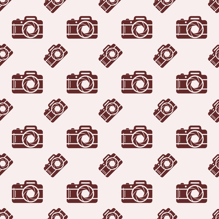 Seamless background with photo cameras. Vector illustration. Abstract photo cameras pattern.のイラスト素材