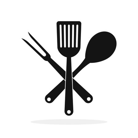 Spoon, fork and spatula. Crossed cooking tools. Black restaurant symbols. Vector illustration.のイラスト素材