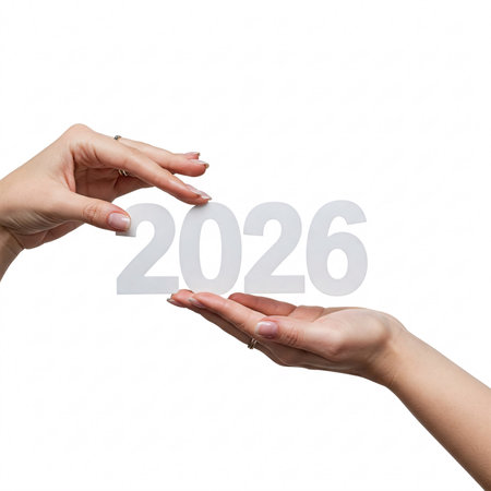Hands holding the number 2026, isolated on a white background.