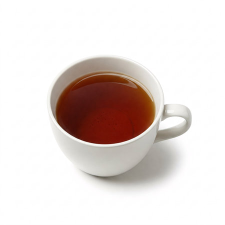 Cup of black tea isolated on white background. Hot beverage in a white mug close-up.の写真素材