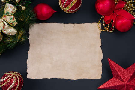Sheet of old paper on christmas background top view mock upの写真素材