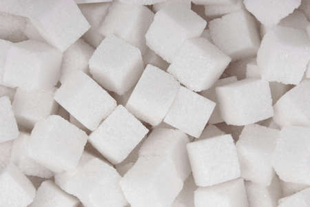 White sugar cubes background top view textureの写真素材