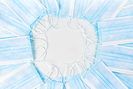 Antivirus protection face mask frame with place for text on blue background