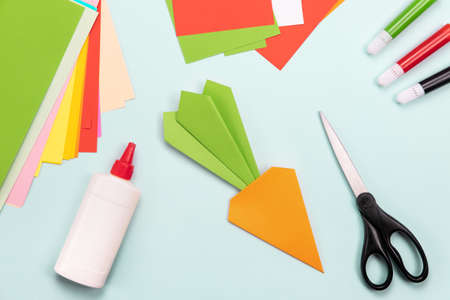 How to make Origami paper bookmark form of carrot for Easter greetings. Children's art project. DIY concept. Step by step photo instruction. Step 6の写真素材