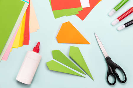 How to make Origami paper bookmark form of carrot for Easter greetings. Children's art project. DIY concept. Step by step photo instruction. Step 5の写真素材