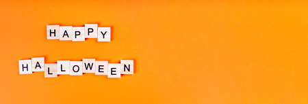Banner Words of happy Halloween on an orange background. Halloween holiday conceptの写真素材