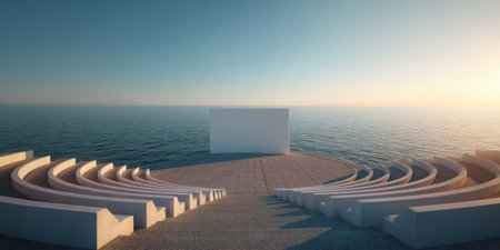Empty outdoor amphitheater featuring a minimalist white screen on a stage overlooking the calm sea. Bathed in the tranquil light of a new dawn. Symbolizing solitude. Contemplation. And new beginningsの素材