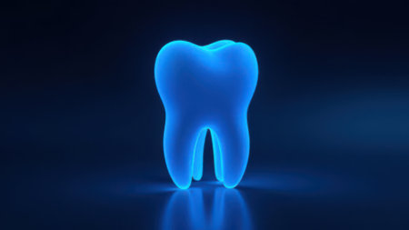 Glowing blue human tooth symbolizes the importance of dental health, promoting hygiene and preventative care for strong, healthy teeth and gumsの素材